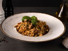 Risotto con Funghi e Maiale Risotto con Funghi e Maiale
